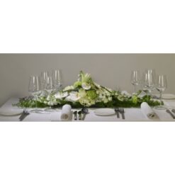 Blomsterdekorationer til aflange borde