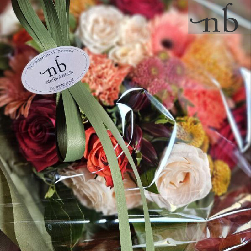 Halloween-buket i orange og lilla med sort bånd, leveret planlagt og sikkert